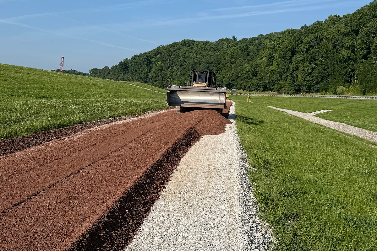 Bulldozer working on rural pathway